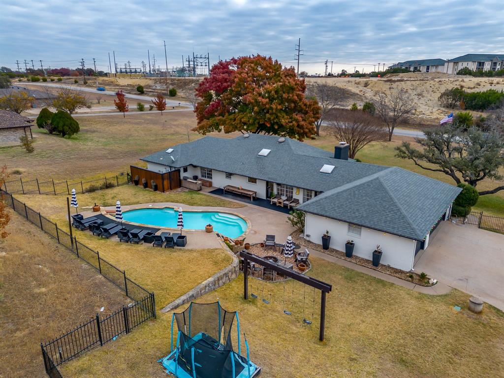 1930 Bethel Road Weatherford, TX 76086 - Photo 3 of 33 an aerial view of a house with a swimming pool yard and outdoor seating