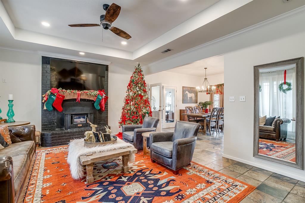1930 Bethel Road Weatherford, TX 76086 - Photo 7 of 33 a living room with furniture and a flat screen tv