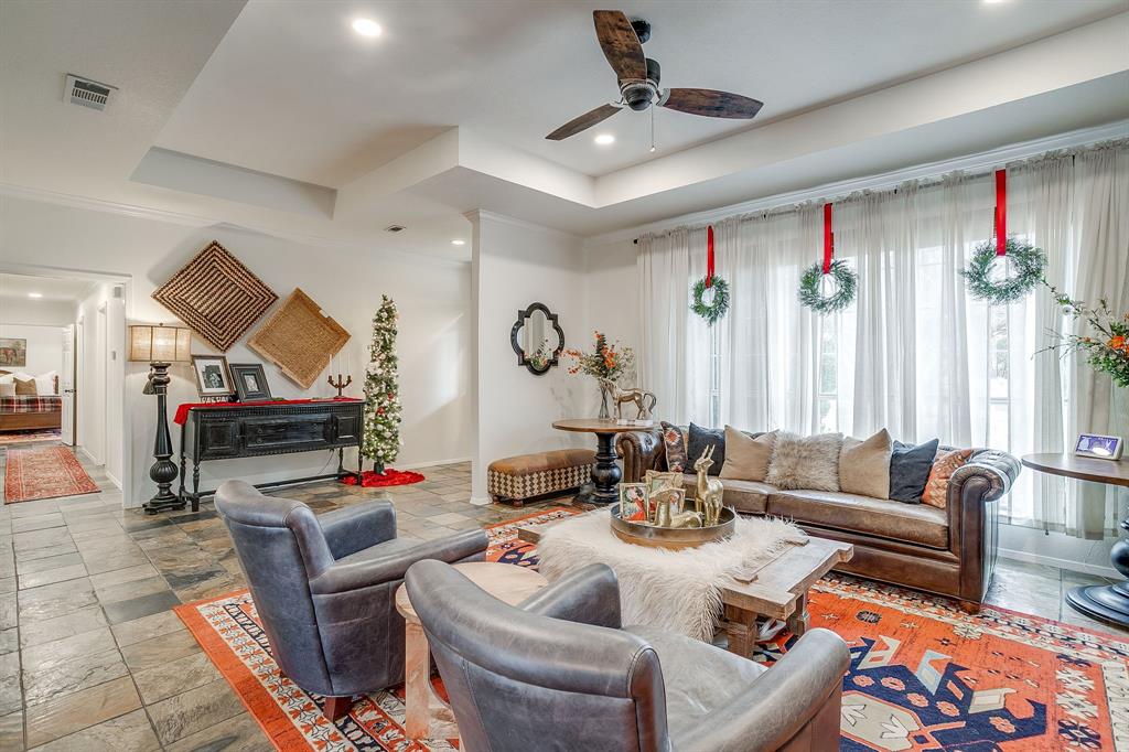 1930 Bethel Road Weatherford, TX 76086 - Photo 9 of 33 a living room with furniture fireplace and rug