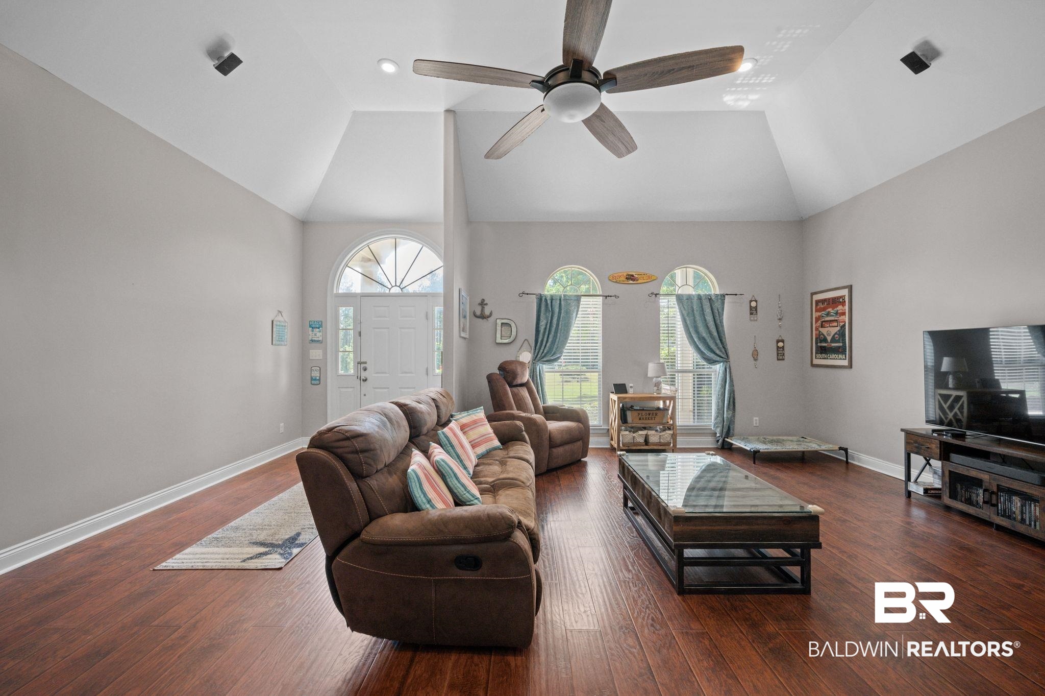 48513 Phillipsville Road Bay Minette, AL 36507 - Photo 9 of 50 Living room featuring wood finished floors, high vaulted ceiling, and ceiling fan