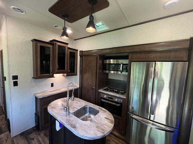 2795 East 28th Road Marseilles, IL 61341 - Photo 11 of 68 a kitchen with stainless steel appliances granite countertop a refrigerator and a stove