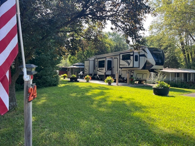 2795 East 28th Road Marseilles, IL 61341 - Photo 2 of 68 a front view of house with yard and outdoor seating