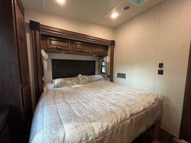 2795 East 28th Road Marseilles, IL 61341 - Photo 21 of 68 a bedroom with a bed and a mirror