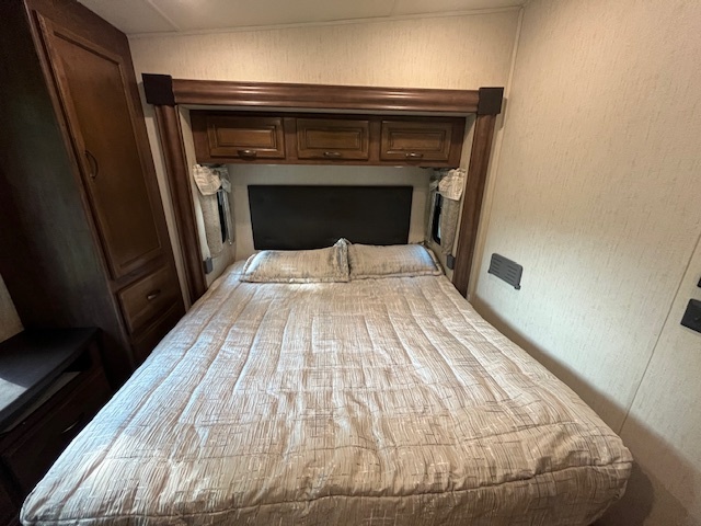 2795 East 28th Road Marseilles, IL 61341 - Photo 22 of 68 a bedroom with a bed and a mirror