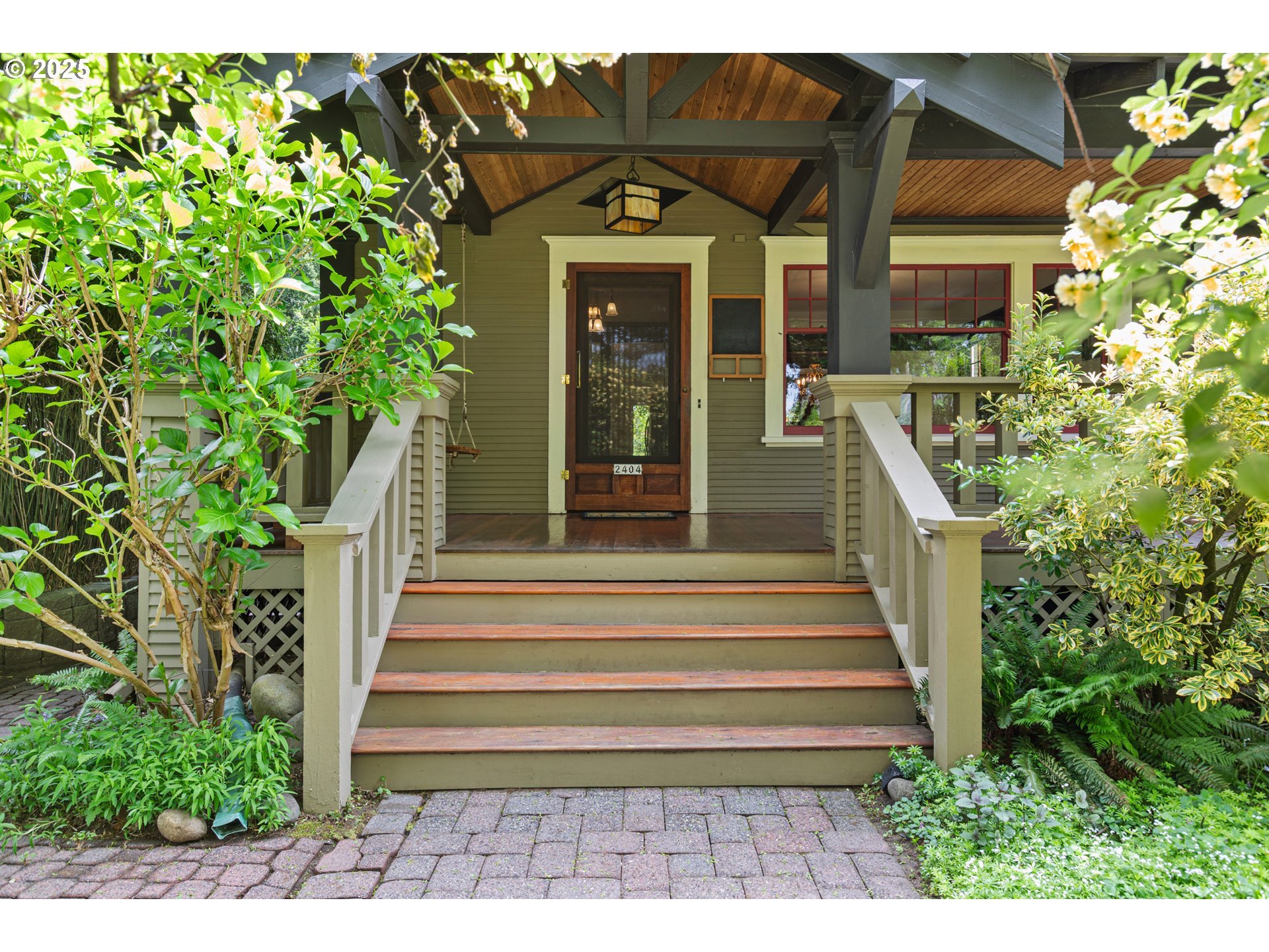 2404 Northeast 47th Avenue Portland, OR 97213 - Photo 2 of 35 a front view of a house with plants
