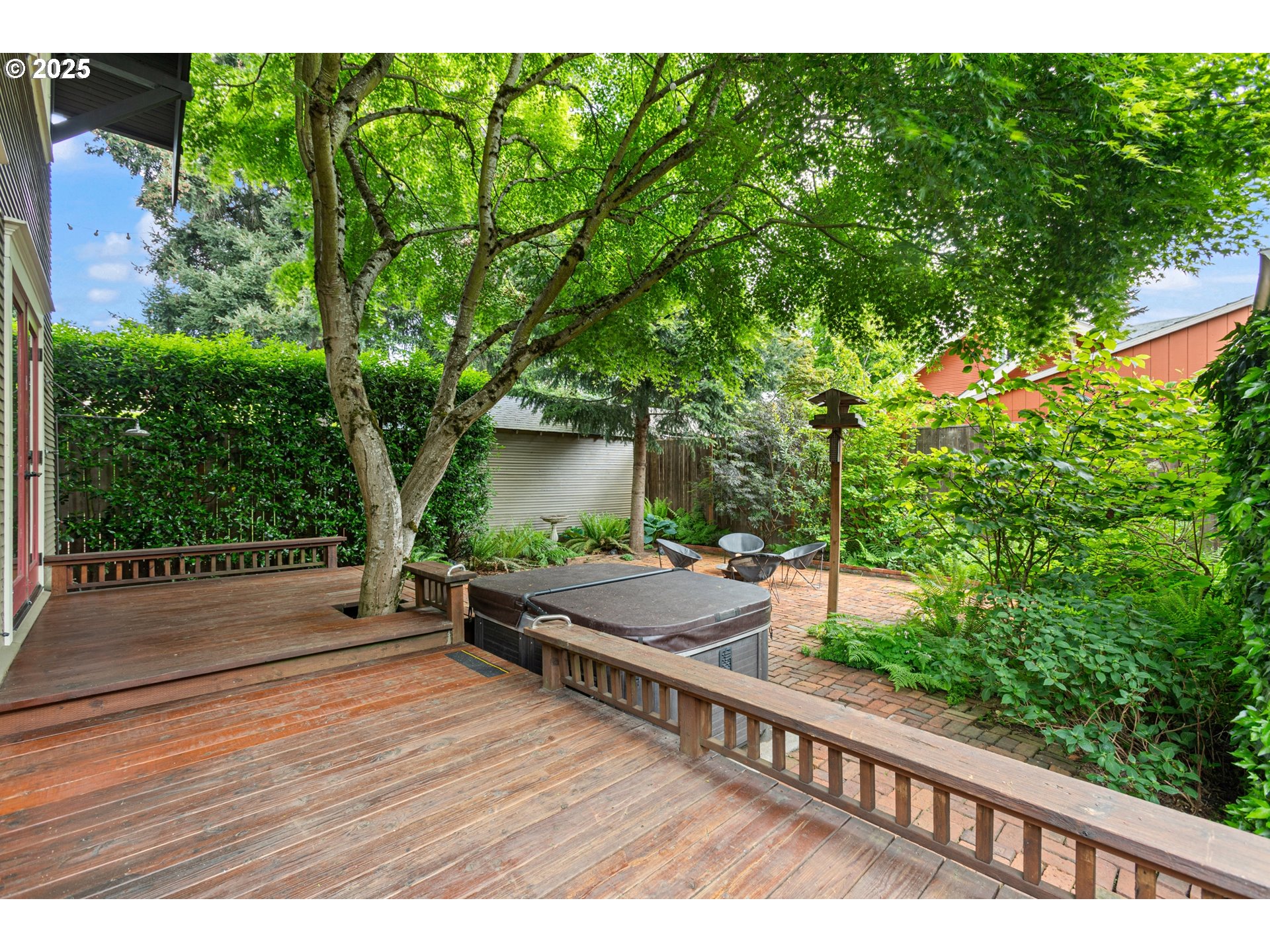2404 Northeast 47th Avenue Portland, OR 97213 - Photo 30 of 35 a backyard of a house with lots of green space
