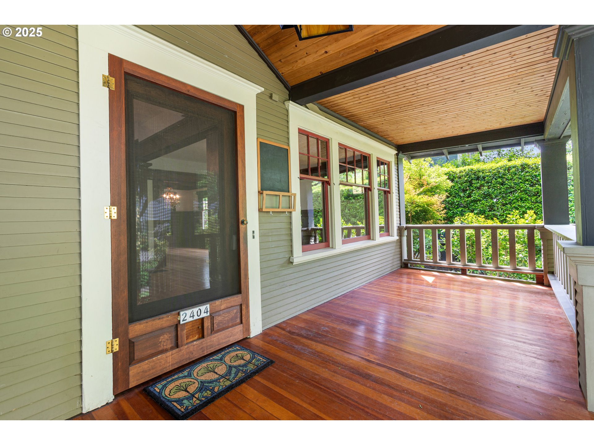 2404 Northeast 47th Avenue Portland, OR 97213 - Photo 4 of 35 a empty room with wooden floor and windows