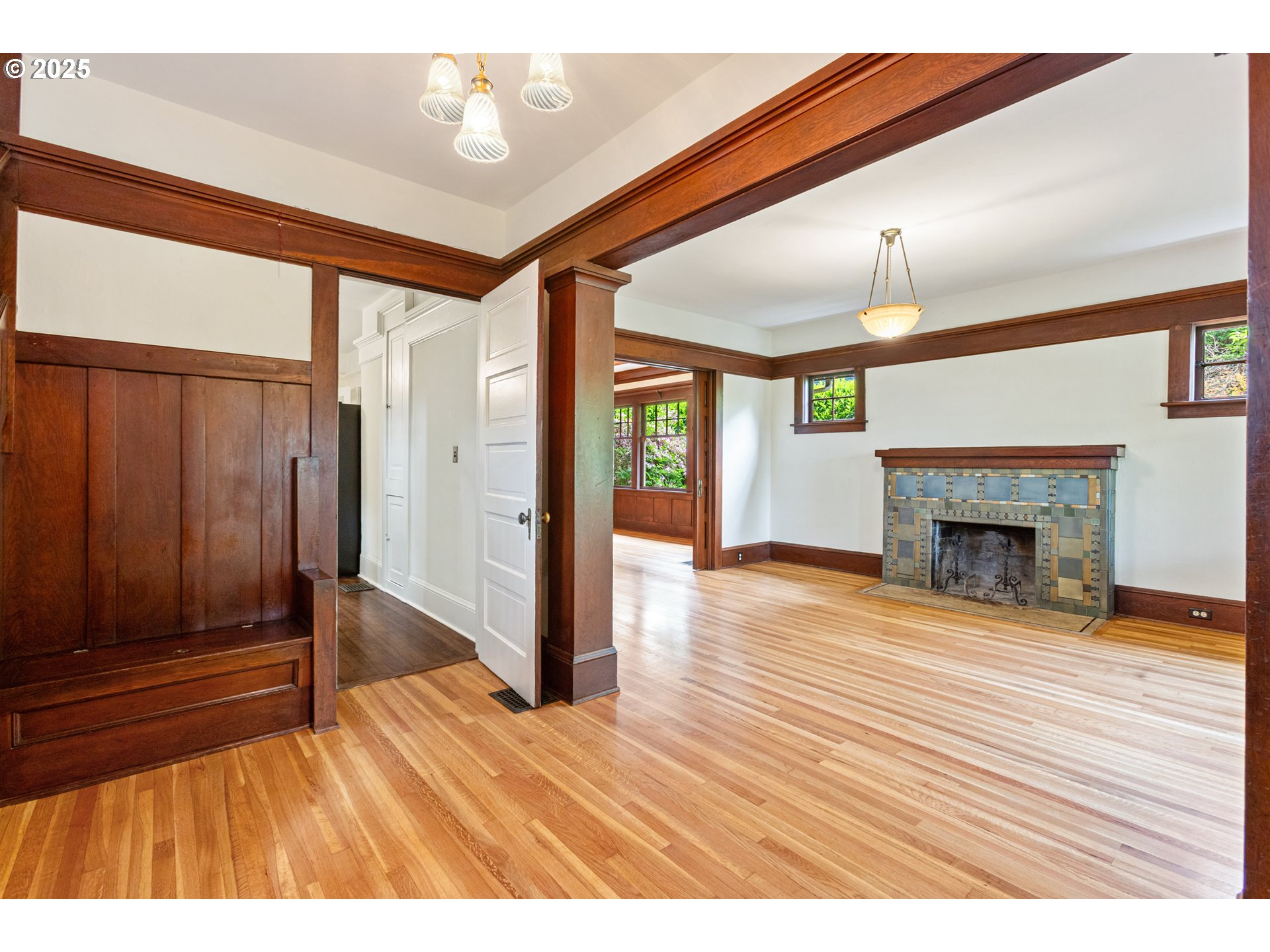 2404 Northeast 47th Avenue Portland, OR 97213 - Photo 7 of 35 a view interior of a house with wooden floor fireplace and windows