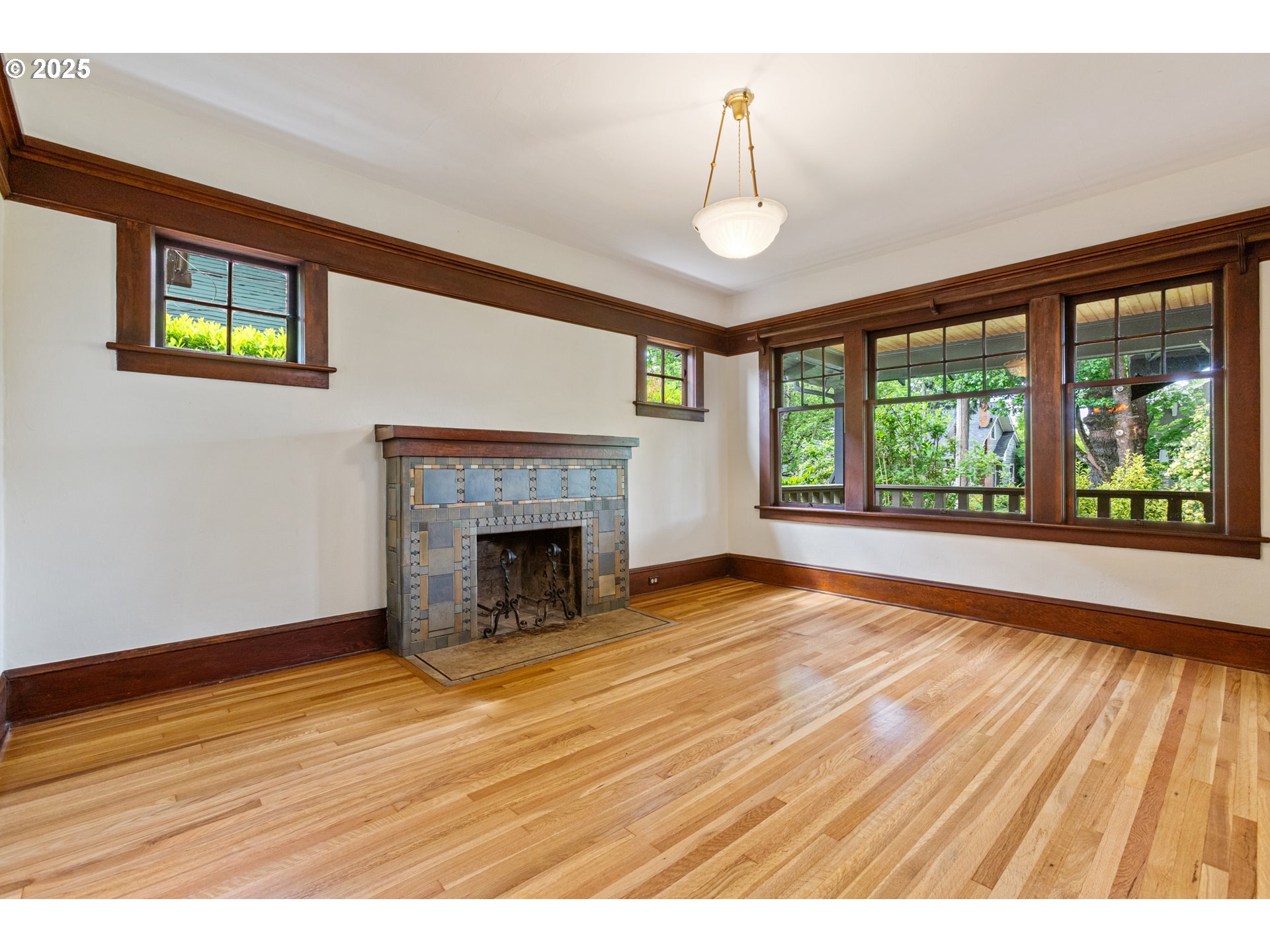 2404 Northeast 47th Avenue Portland, OR 97213 - Photo 9 of 35 a view of empty room with wooden floor and fan