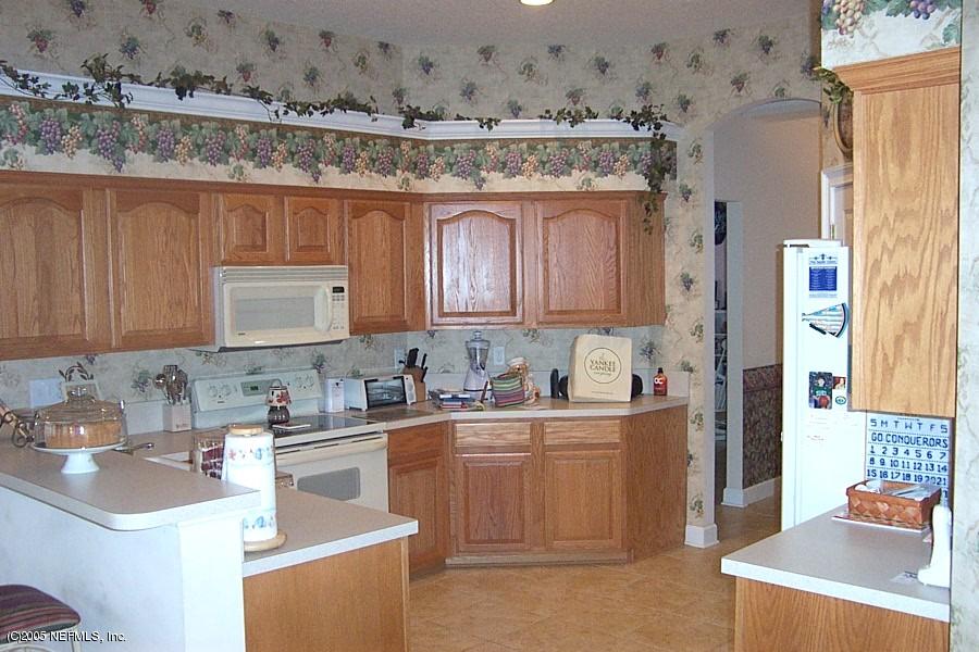 10967 Falkland Road Jacksonville, FL 32221 - Photo 6 of 15 kitchen with breakfast bar