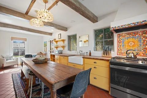 a kitchen with granite countertop lots of counter top space