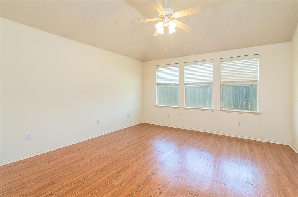 107 Hazelnut Trail Forney, TX 75126 - Photo 22 of 37 Primary bedroom with large walk-in closet and en-suite bath.