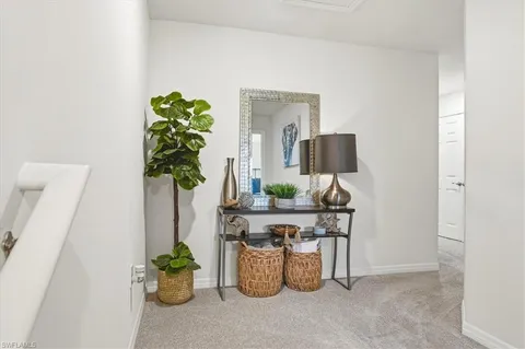 a room with a table and chairs
