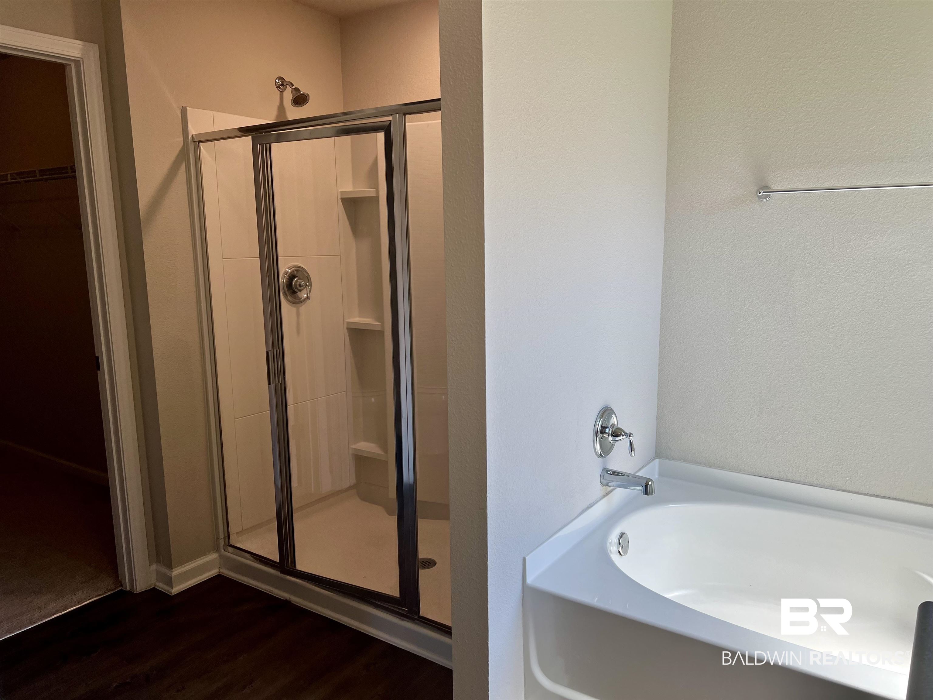 1612 Abbey Loop Foley, AL 36535 - Photo 20 of 30 Bathroom with shower, separate bathtub.