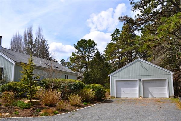 3 Piney Point Road Marion, MA 02738 - Photo 5 of 20 a view of a house with a yard and plants
