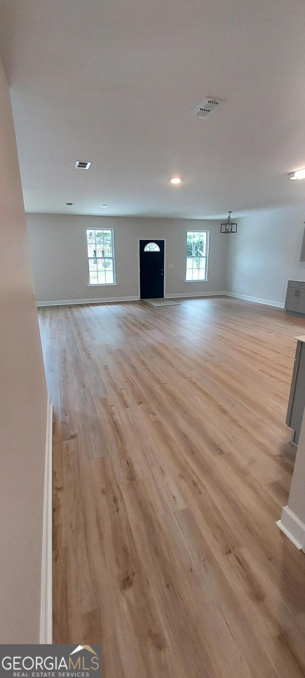 415 Charles Street Bainbridge, GA 39819 - Photo 4 of 9 a view of a livingroom with a window
