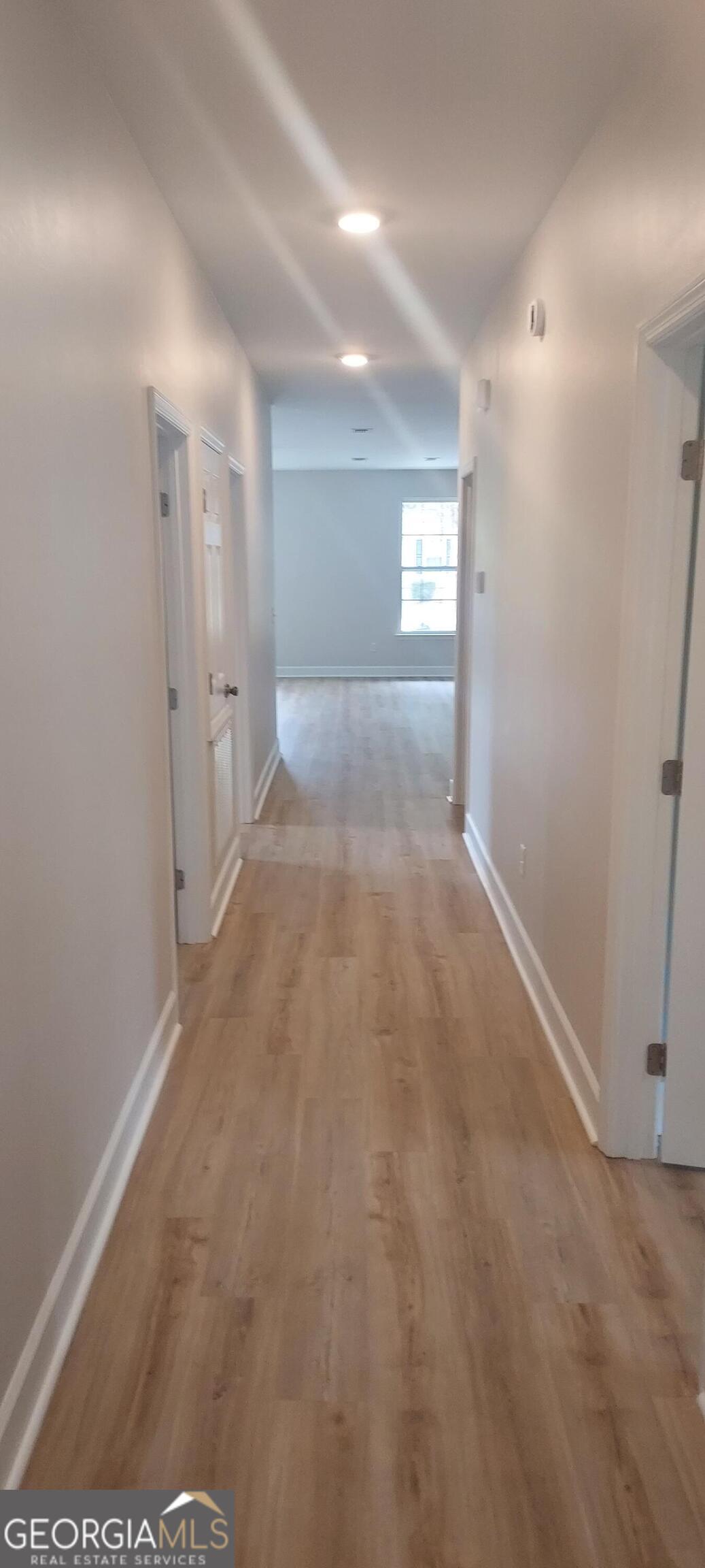 415 Charles Street Bainbridge, GA 39819 - Photo 6 of 9 a view of hallway with window