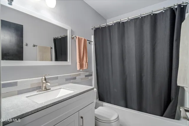 a porch with a glass door