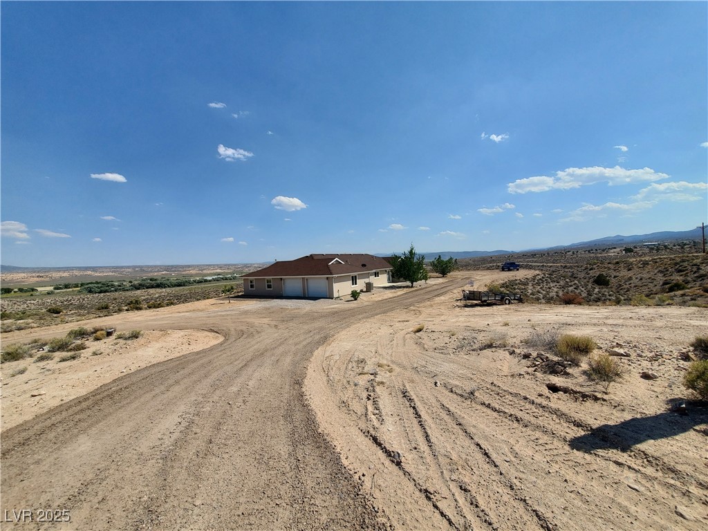 5272 Truman Lane Caliente, NV 89008 - Photo 27 of 39 View of dirt / gravel road featuring a rural view