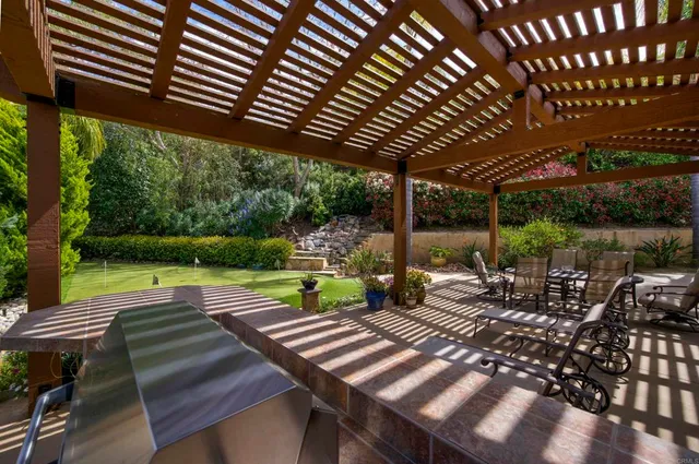 a view of yard with patio