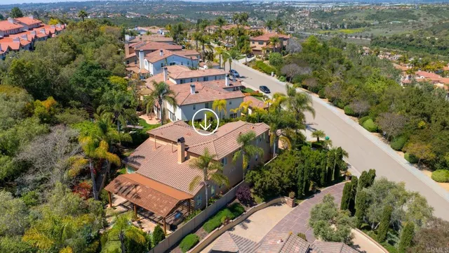 an aerial view of a house with a garden