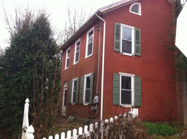 624 Georgetown Road Nazareth, PA 18064 - Photo 3 of 6 a front view of a house with a yard