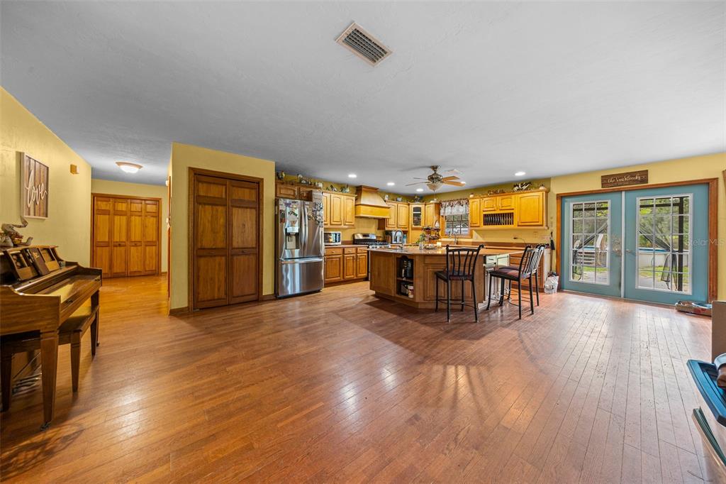 732 Carl Wilson Road Fort White, FL 32038 - Photo 2 of 80 a view of a dining room with furniture wooden floor and chandelier