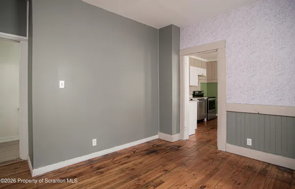 a bathroom with a shower curtain