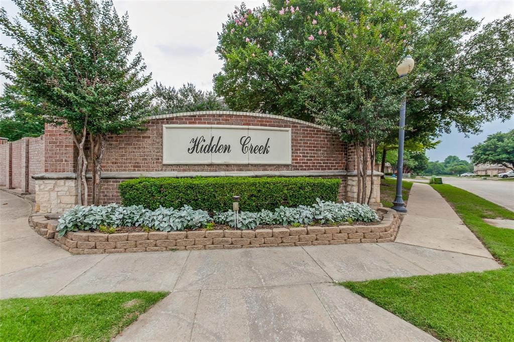 8524 Heather Ridge Drive Plano, TX 75024 - Photo 27 of 27 a sign on the side of a building