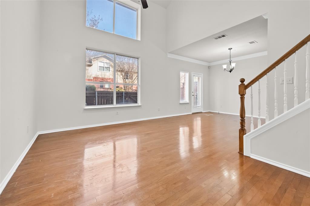8524 Heather Ridge Drive Plano, TX 75024 - Photo 5 of 27 a view of empty room with wooden floor and fan