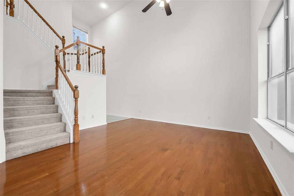 8524 Heather Ridge Drive Plano, TX 75024 - Photo 7 of 27 a view of an entryway with wooden floor