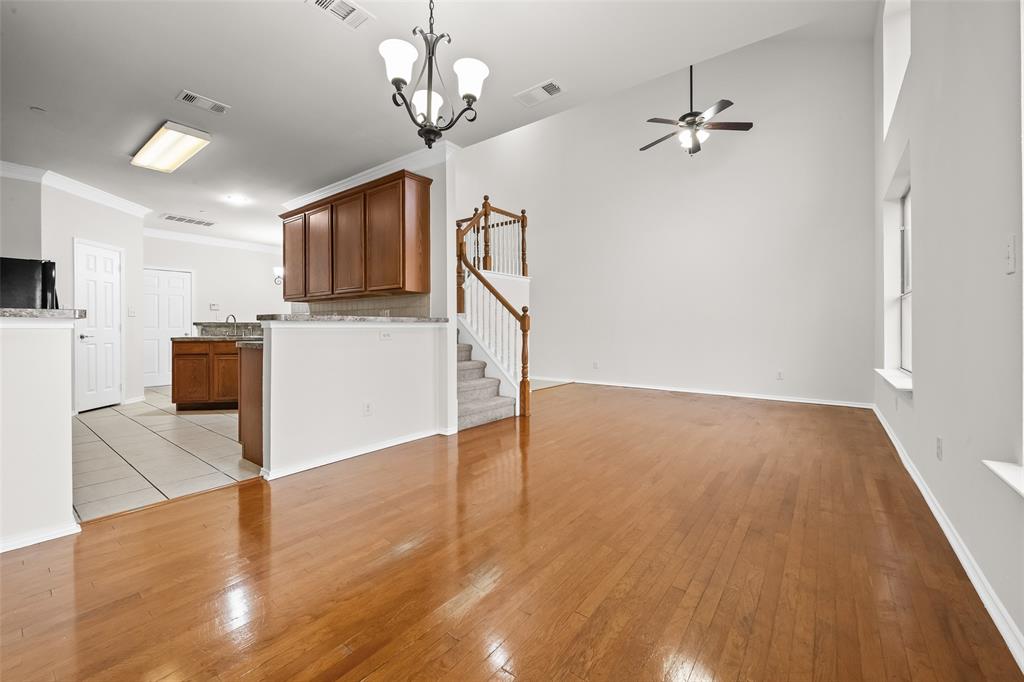 8524 Heather Ridge Drive Plano, TX 75024 - Photo 8 of 27 a view of a livingroom with a furniture wooden floor and windows