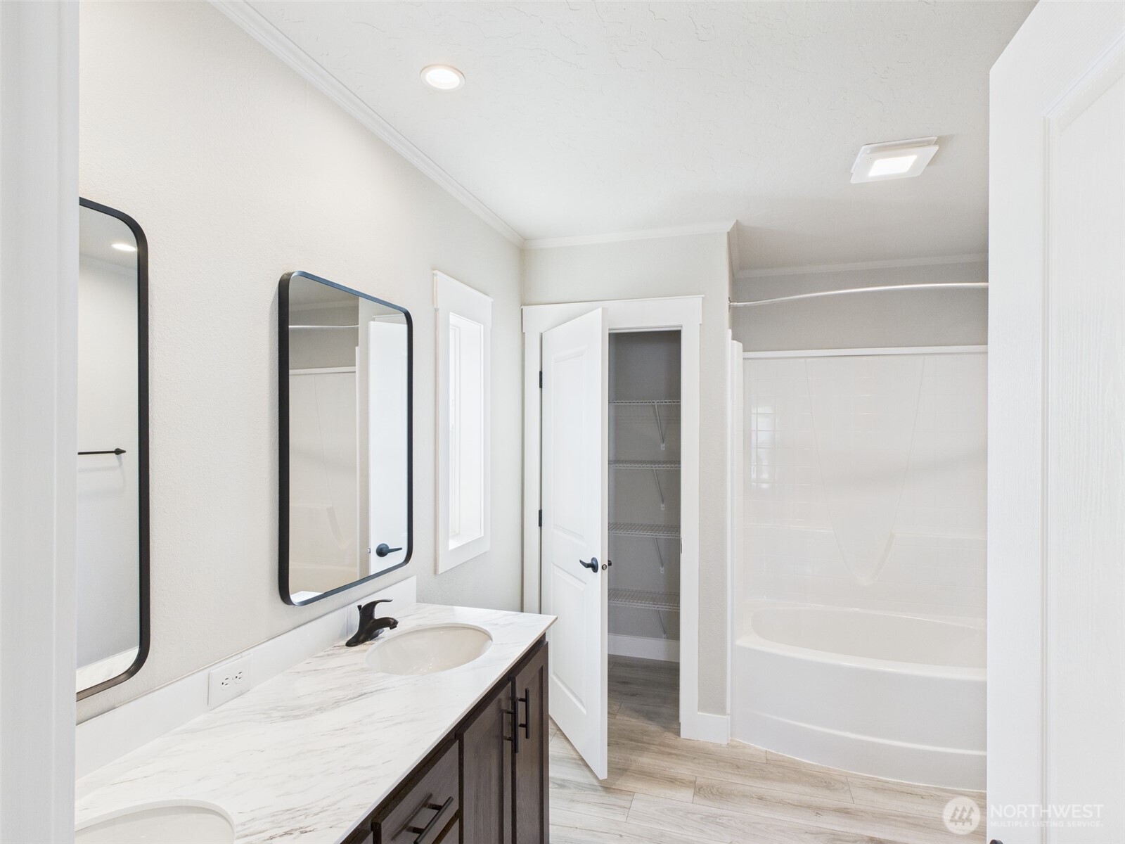 720 South Jefferson Street Republic, WA 99166 - Photo 14 of 27 a bathroom with a granite countertop sink and a mirror