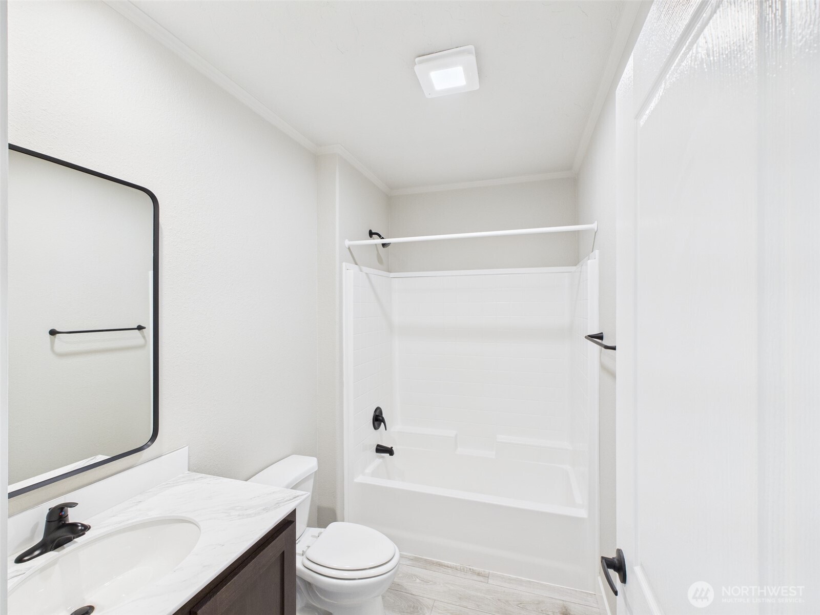 720 South Jefferson Street Republic, WA 99166 - Photo 15 of 27 a bathroom with a sink toilet and shower