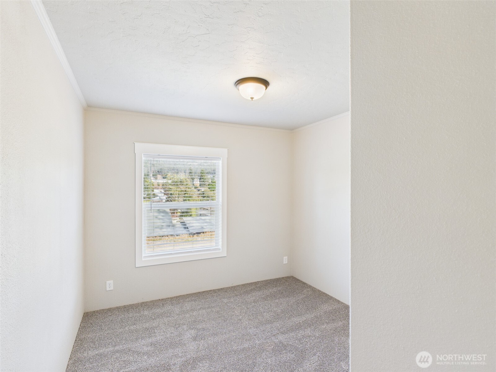 720 South Jefferson Street Republic, WA 99166 - Photo 16 of 27 an empty room with windows