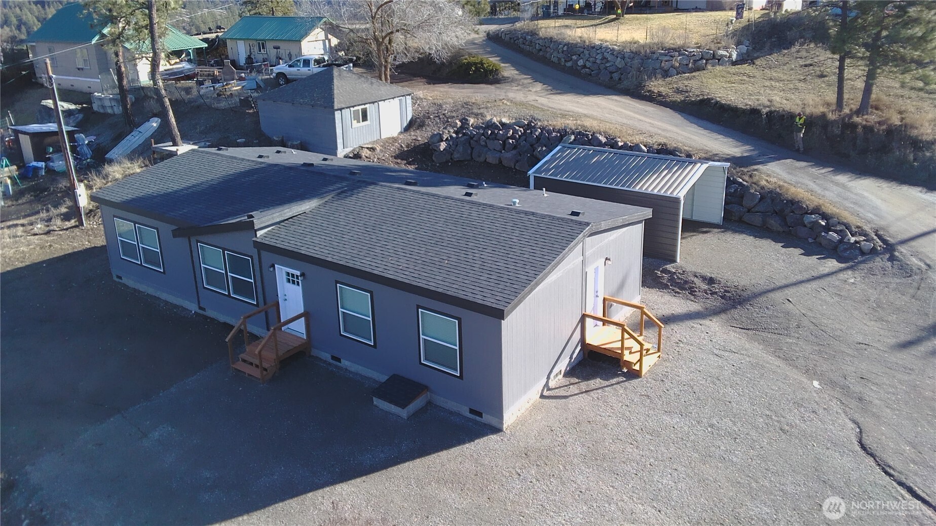 720 South Jefferson Street Republic, WA 99166 - Photo 2 of 27 an aerial view of a house with a yard