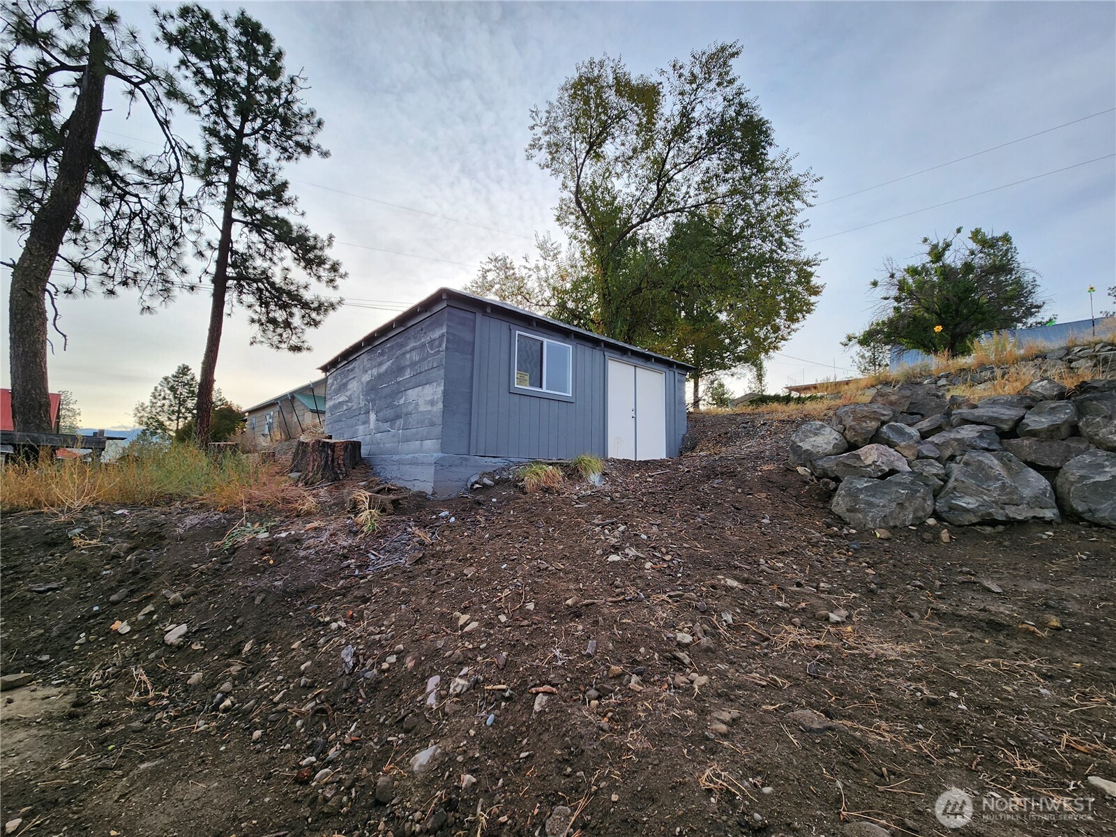 720 South Jefferson Street Republic, WA 99166 - Photo 23 of 27 a view of a house with a yard