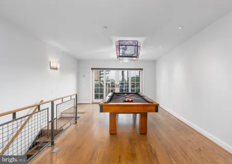 a room with furniture and wooden floor