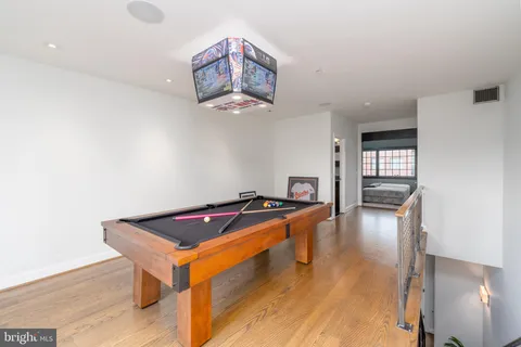 a room with furniture and wooden floor