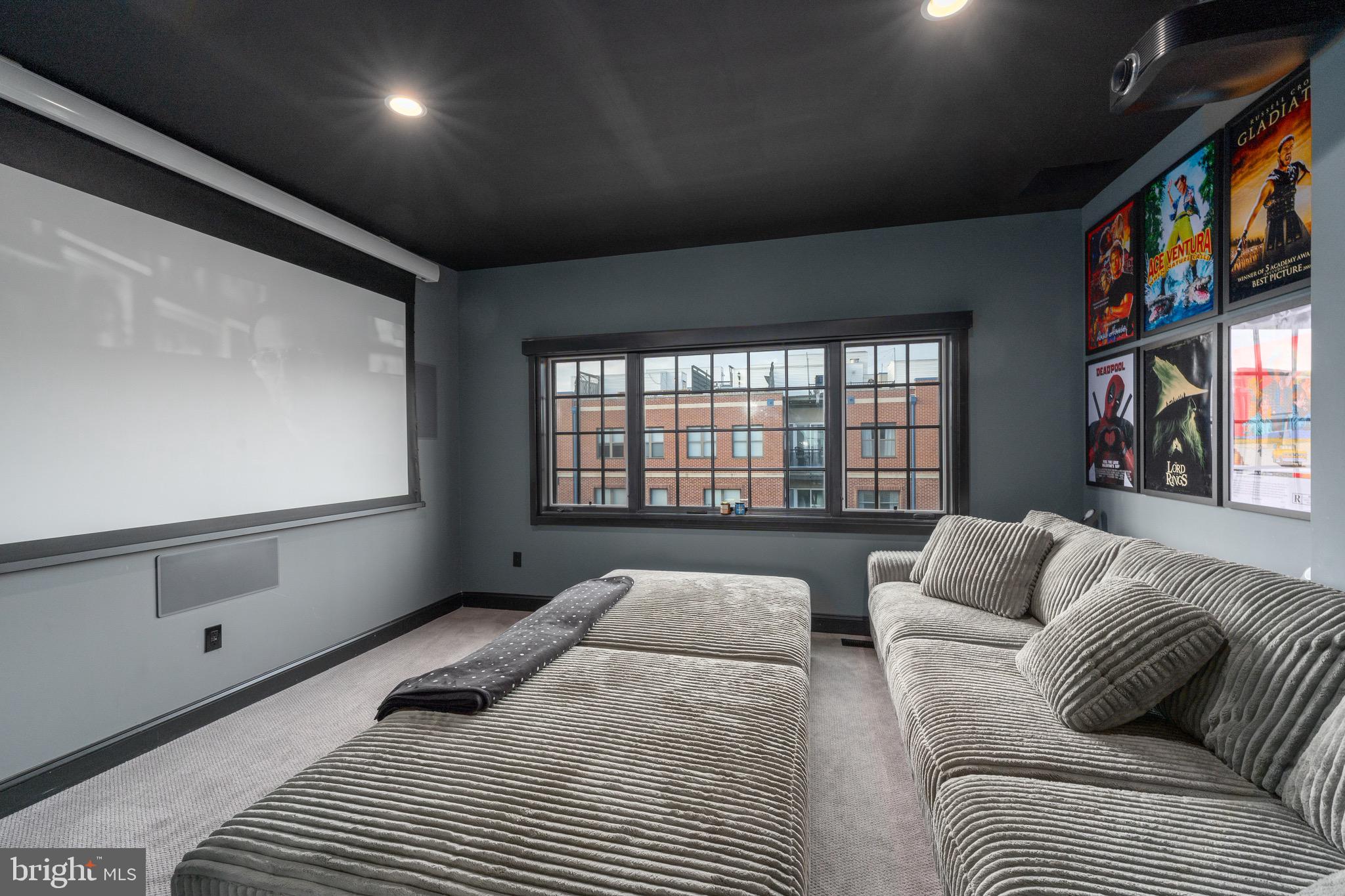 1735 Aliceanna Street Baltimore, MD 21231 - Photo 22 of 48 a bedroom with two beds and a large window