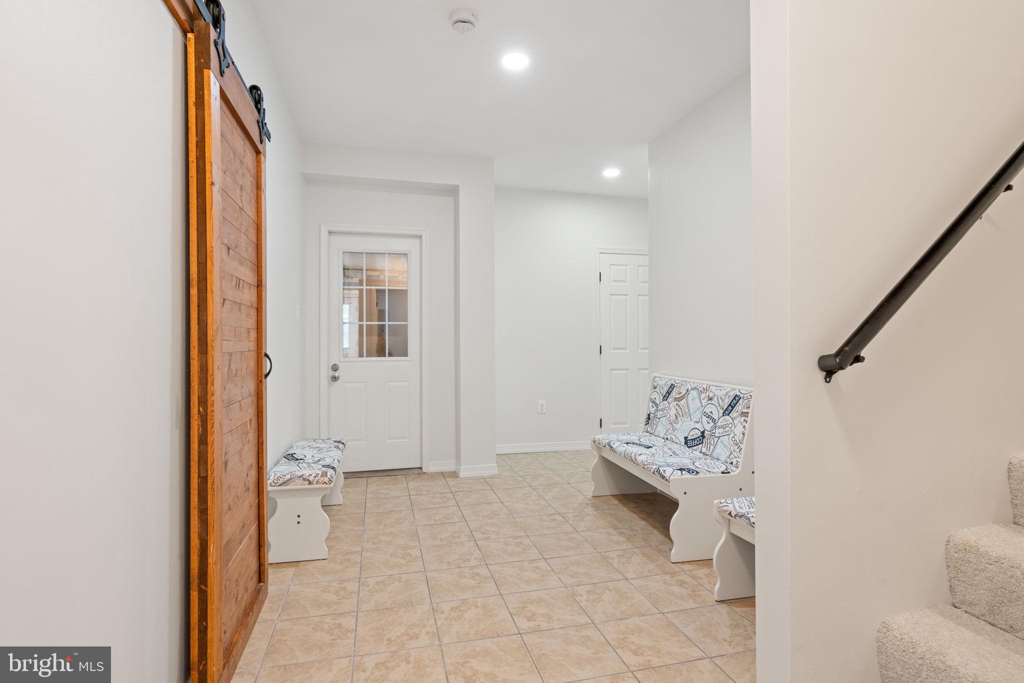 208 Markham Farm Road Front Royal, VA 22630 - Photo 70 of 85 Lower level Foyer to garage, storm shelter