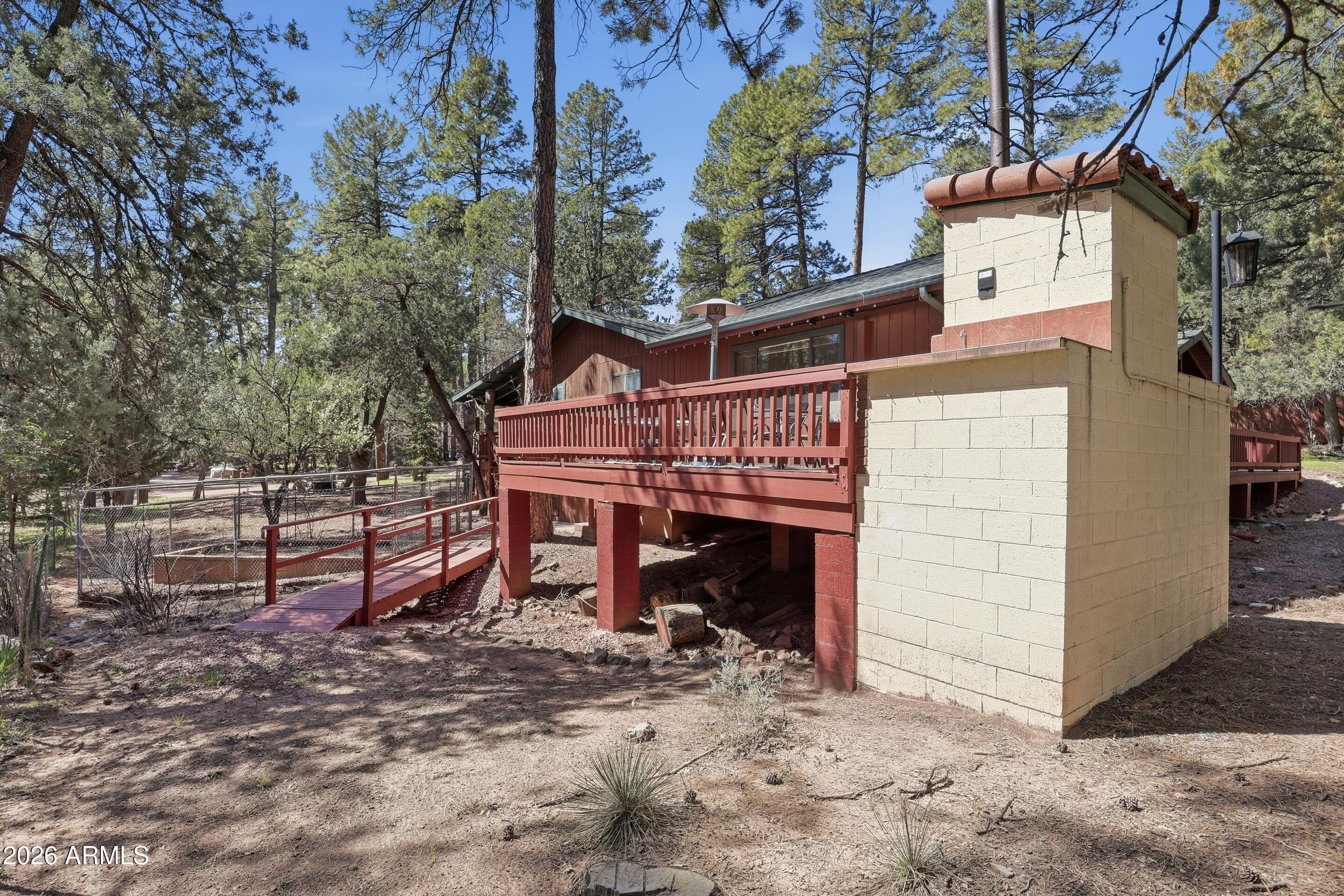 6740 Ridge Road Pine, AZ 85544 - Photo 31 of 35 a front view of a house with a yard