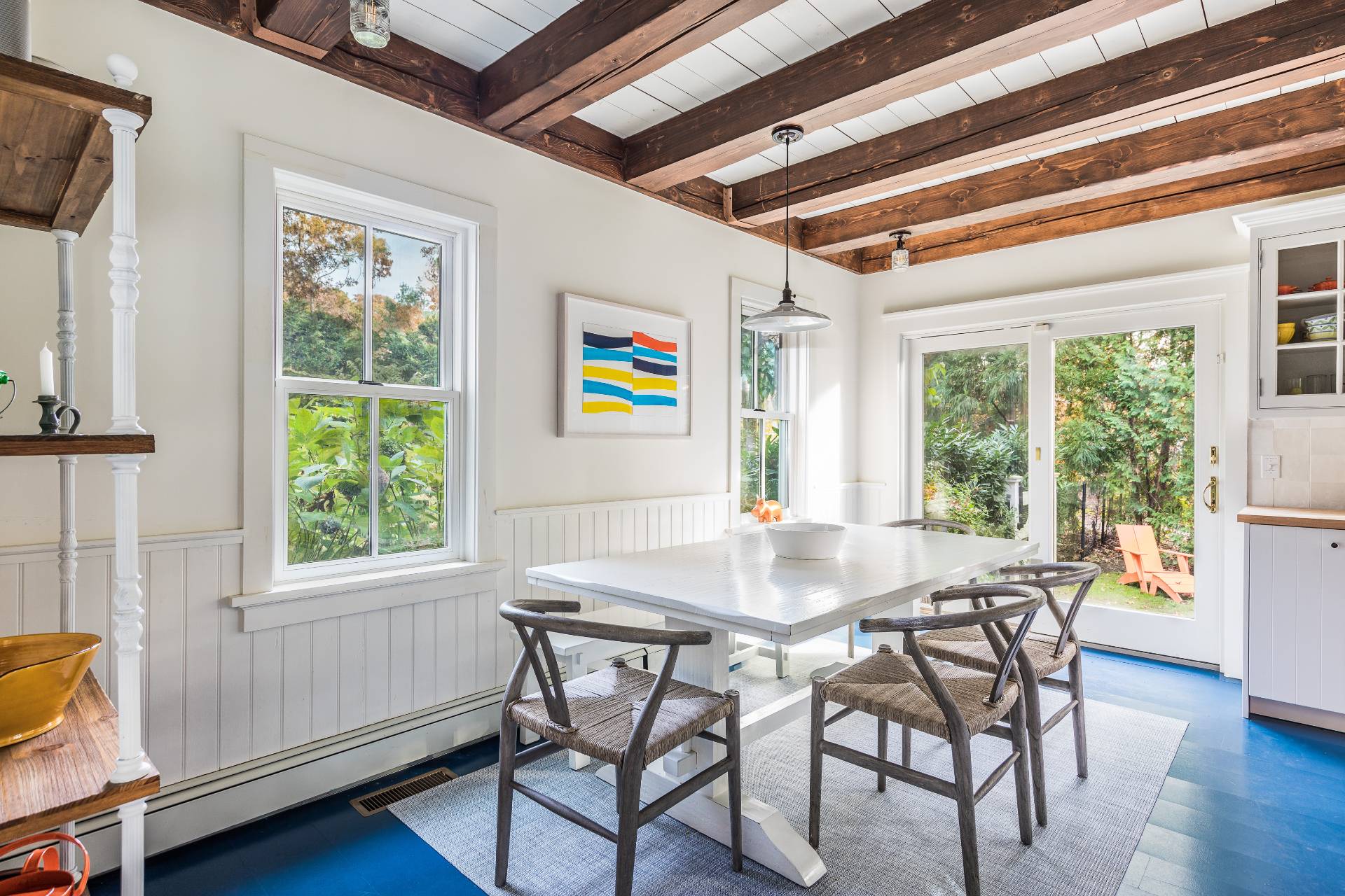 93 Wainscott NW Road Wainscott, NY 11975 - Photo 12 of 24 a view of a dining room with furniture and wooden floor
