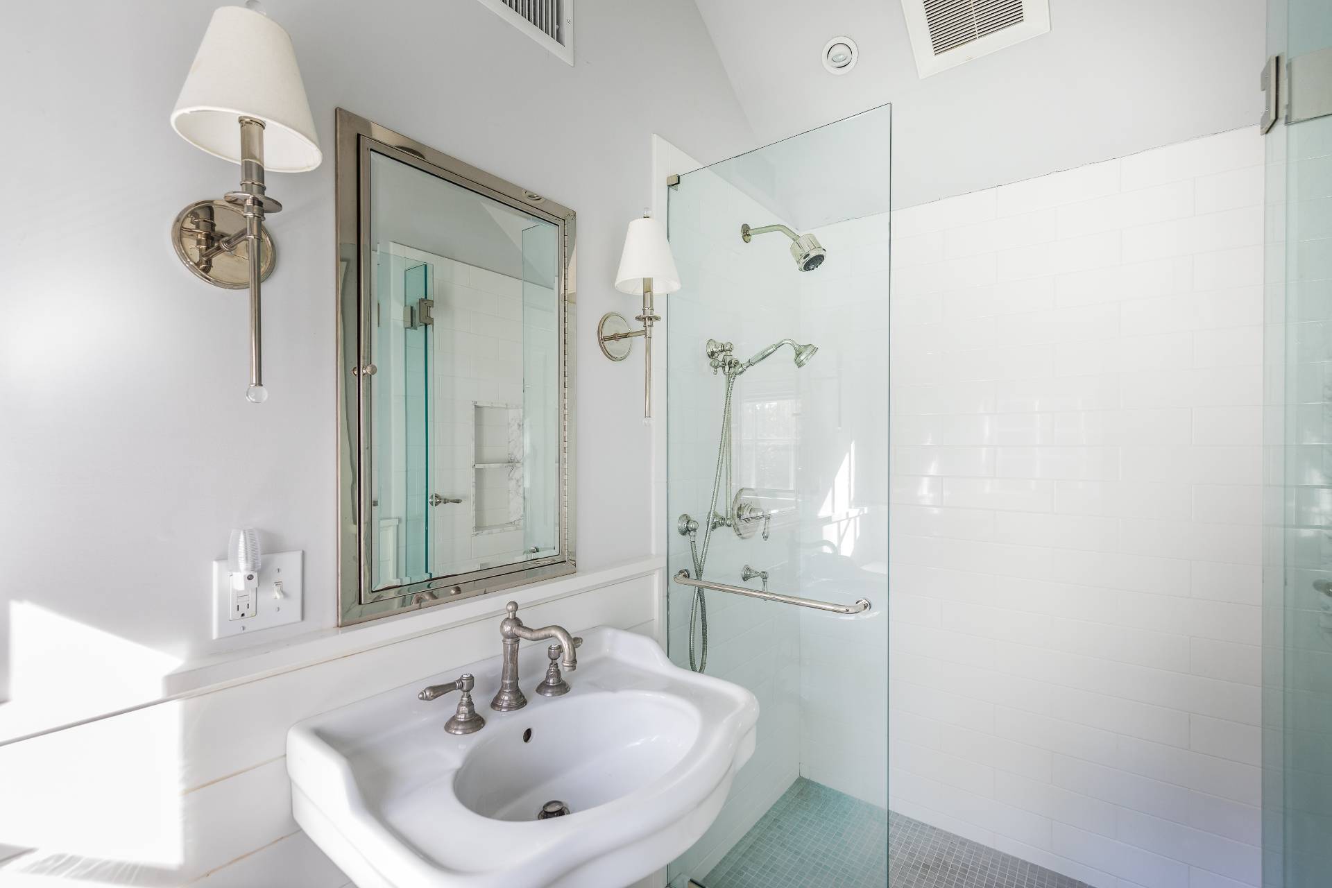 93 Wainscott NW Road Wainscott, NY 11975 - Photo 17 of 24 a bathroom with a sink and a mirror