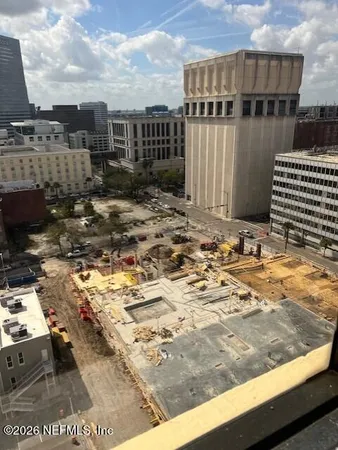 a bathroom with a sink toilet and a mirror