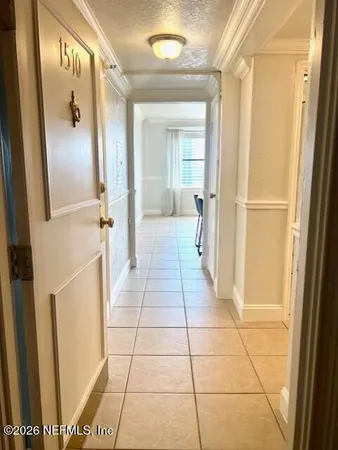 a bathroom with a glass door shower and a mirror