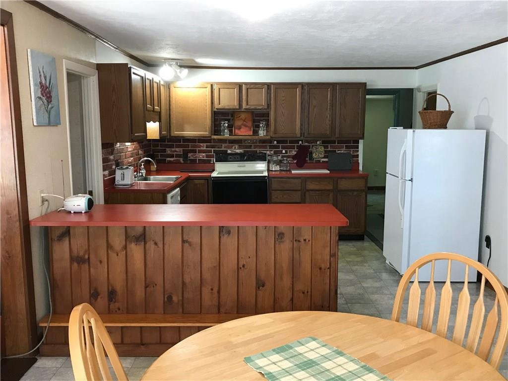 88 Vickery Road Auburn, ME 04210 - Photo 12 of 23 Kitchen offers island & sit up...