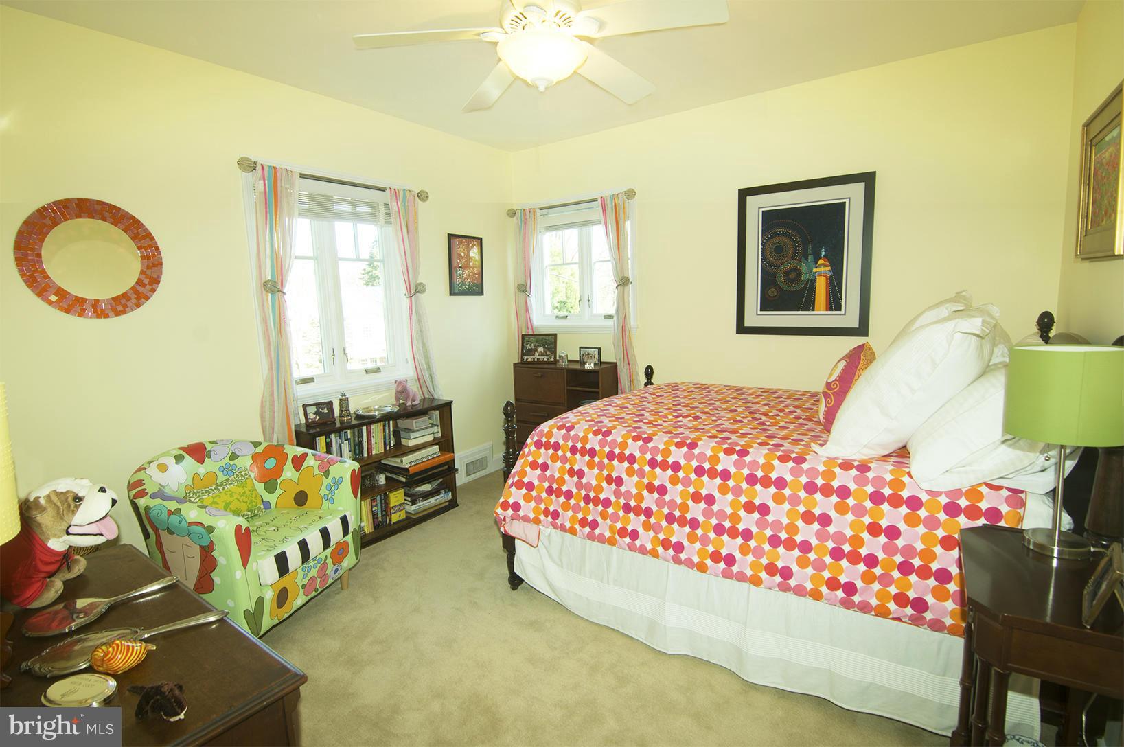 107 Castlewood Road Baltimore, MD 21210 - Photo 22 of 30 a bedroom with bed and a window