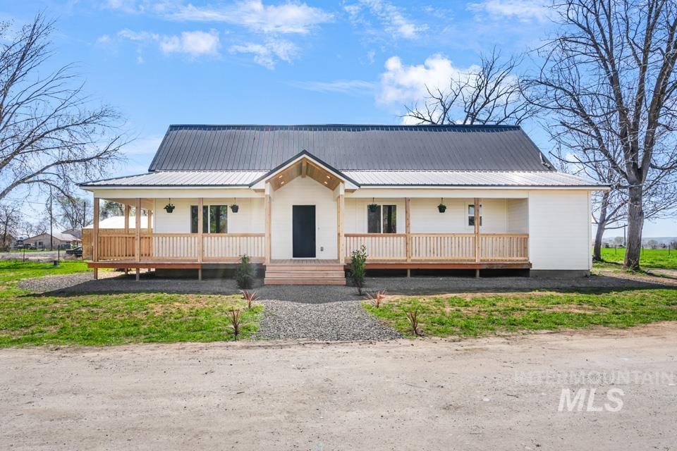 535 Day Road Weiser, ID 83672 - Photo 1 of 44 View of front of property with a porch and a metal roof