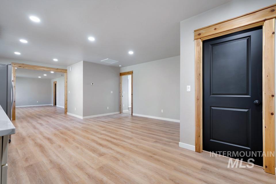 535 Day Road Weiser, ID 83672 - Photo 20 of 44 Spare room with recessed lighting and light wood-style flooring